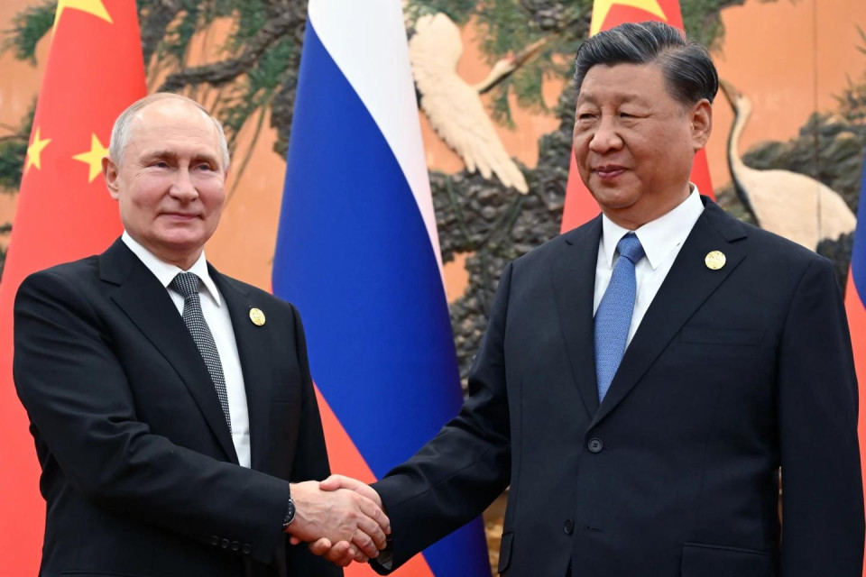 FILE - Chinese President Xi Jinping, right, and Russian President Vladimir Putin pose prior to their talks on the sidelines of the Belt and Road Forum in Beijing, China, on Oct. 18, 2023. (AP Photo)