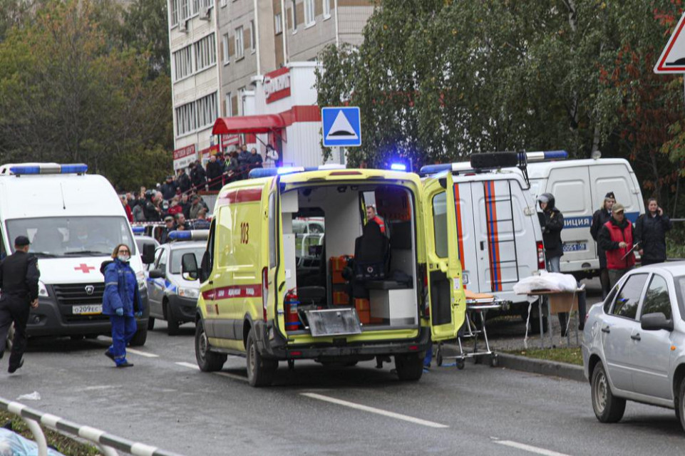 Police and paramedics work at the scene of a shooting at school No. 88 in Izhevsk, Russia, Monday, Sept 26, 2022. (AP/RSS Photo)