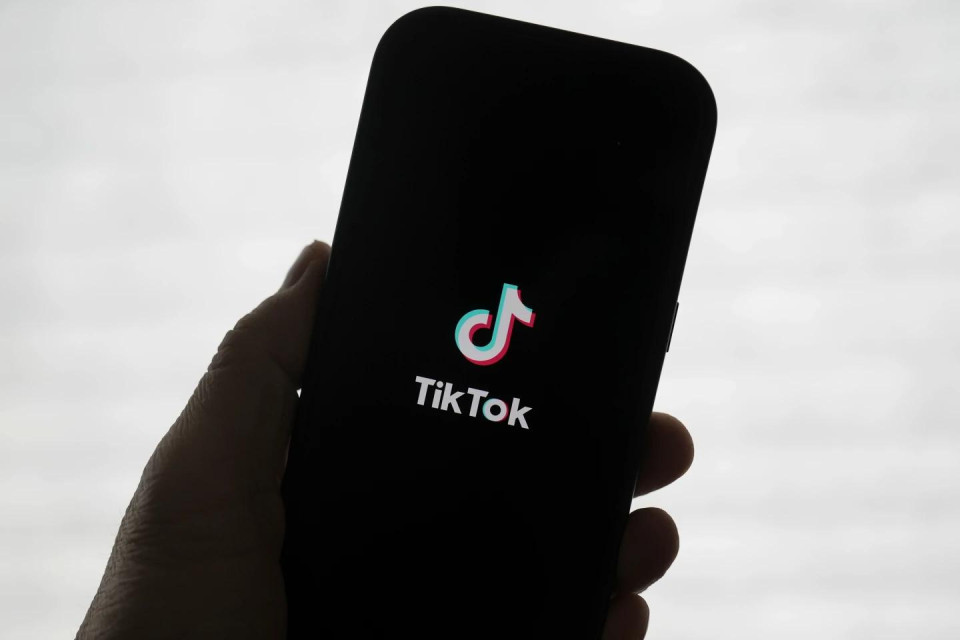 A TikTok logo is shown on a phone in San Francisco, Friday, Jan. 17, 2025. (AP Photo)