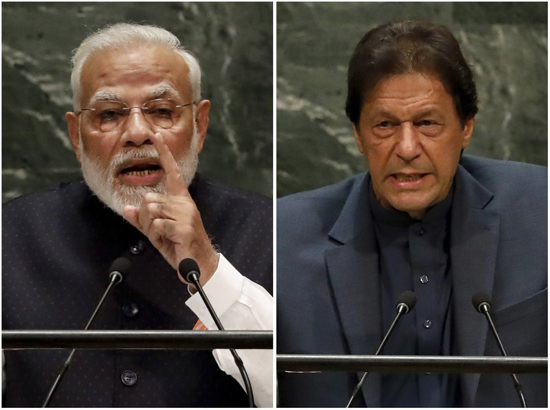 Narendra Modi (l) and Imran Khan