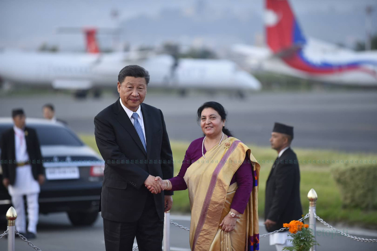 President Bidya Devi Bhandari welcomes her Chinese counterpart Xi Jinping at the TIA on Saturday. Photo: Narayan Maharjan