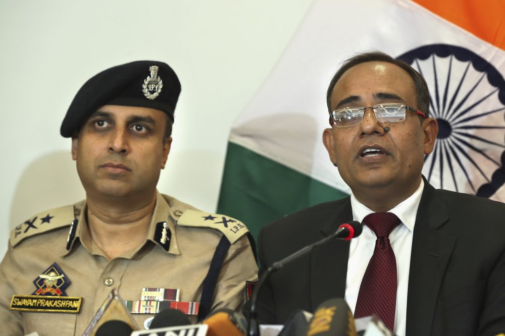 Government spokesperson Rohit Kansal, right, speaks as Swayam Prakash Pani, Inspector General of Kashmir Police sits beside him in Srinagar, Kashmir on Saturday.