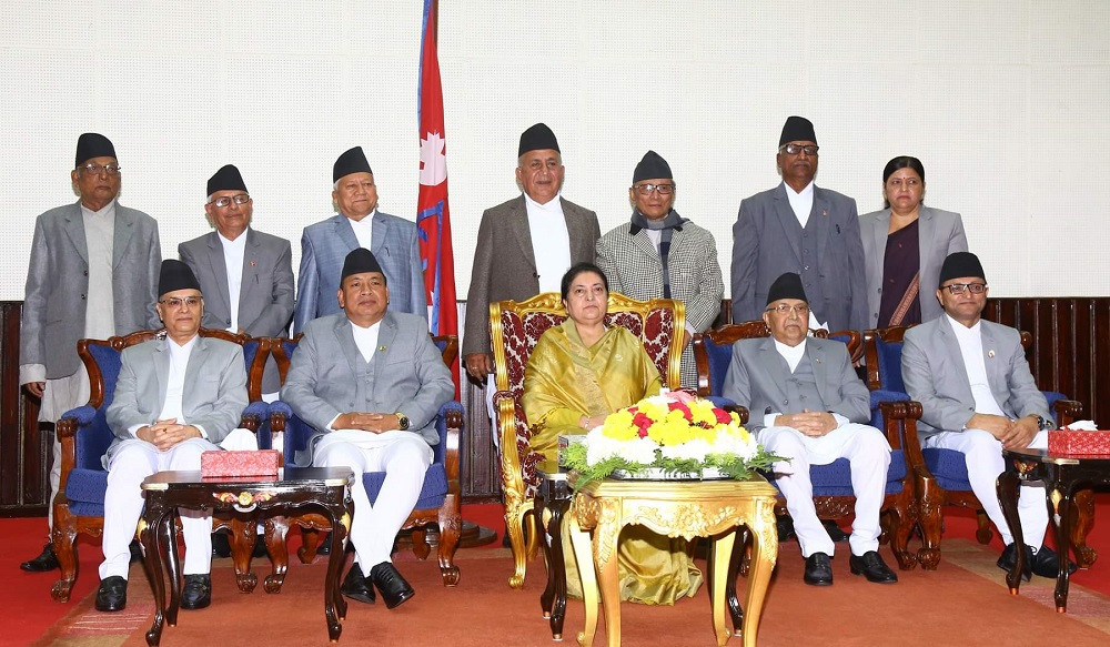 The newly appointed provincial chiefs (standing) pose for photographs with President Bidya Devi Bhandari (sitting at center), PM KP Sharma Oli (on her right) and others.