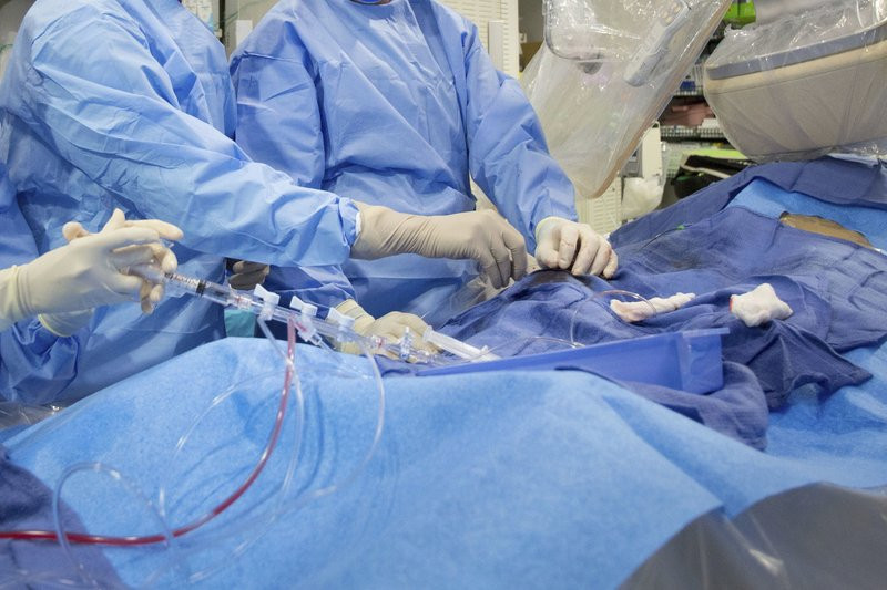 In this Feb. 16, 2017 file photo, surgeons perform a non-emergency angioplasty at Mount Sinai Hospital in New York.