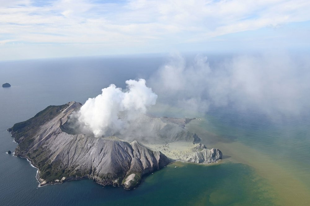 This aerial photo shows White Island after its volcanic eruption in New Zealand Monday, Dec. 9, 2019. The volcano on a small New Zealand island frequented by tourists erupted Monday, and a nu