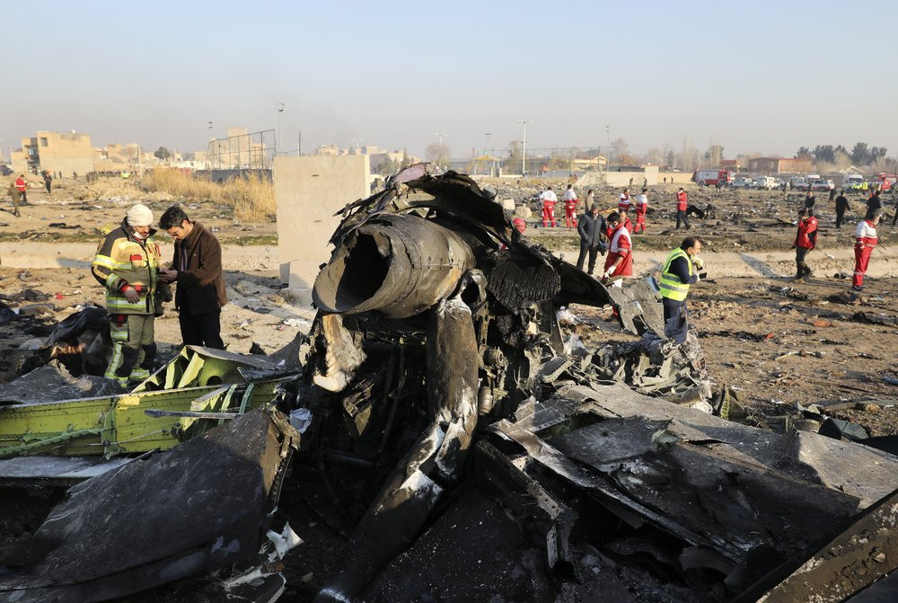 In this Wednesday, Jan. 8, 2020 file photo debris at the scene where a Ukrainian plane crashed in Shahedshahr southwest of the capital Tehran, Iran.