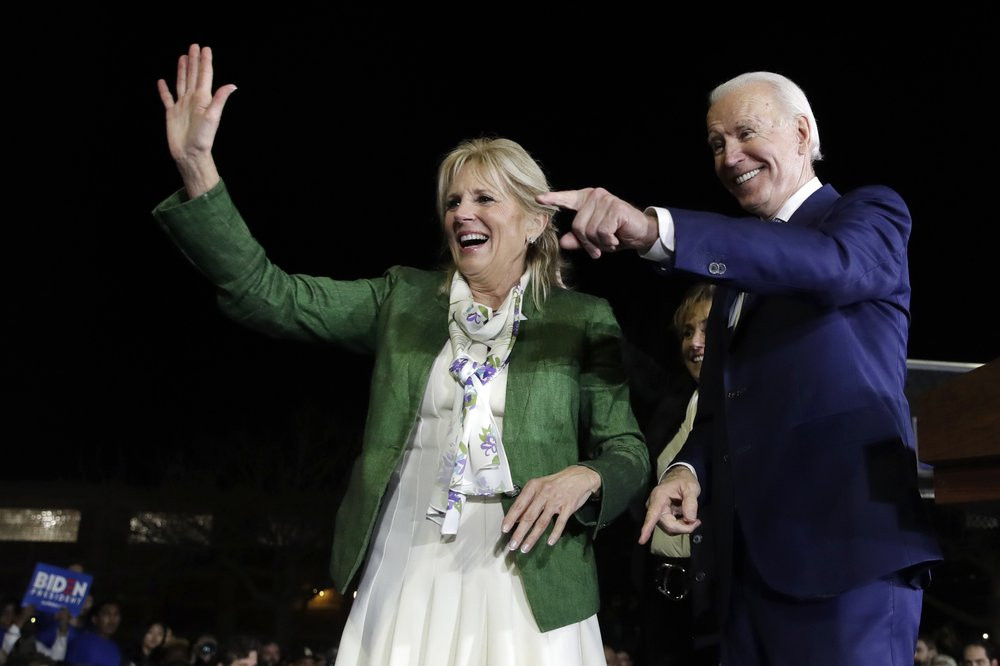 Democratic presidential candidate former Vice President Joe Biden, right, and his wife Jill attend a primary election night rally Tuesday, March 3, 2020, in Los Angeles.