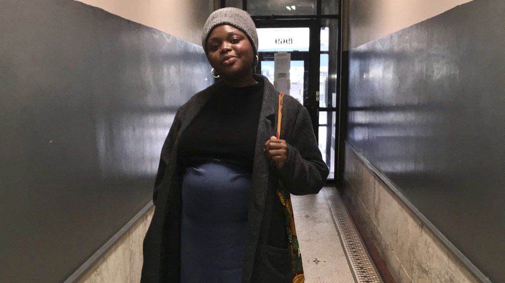 This Feb 1, 2020 photo provided Maureen Nicol shows her in Harlem, N.Y. Nicol, a single Columbia University PhD student pregnant with her first child, will be giving birth out of state, not a