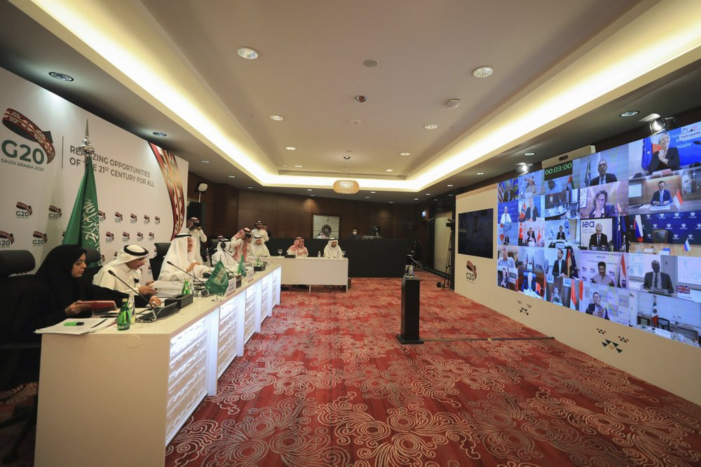 In this photo released by Saudi Energy Ministry, Prince Abdulaziz bin Salman Al-Saud, Minister of Energy of Saudi Arabia, third right, chairs a virtual summit of the Group of 20 energy minist