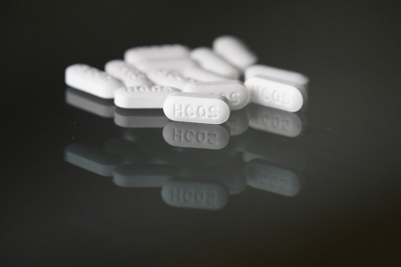This Monday, April 6, 2020 file photo shows an arrangement of hydroxychloroquine pills in Las Vegas.