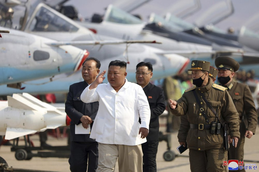 In this undated file photo provided by the North Korean government on April 12, 2020, North Korean leader Kim Jong Un inspects an air defense unit in western area, North Korea.