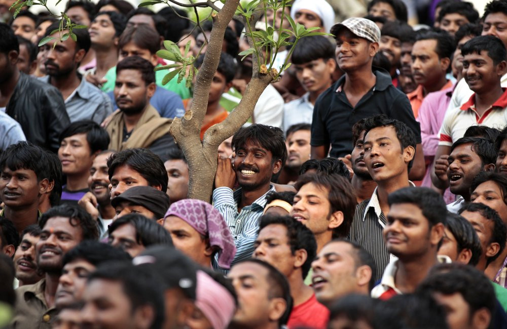 In this Thursday, April 26, 2012, file photo, inmates of Tihar jail, the largest complex of prisons in South Asia, enjoy a show of music and dance during a musical evening at the prison in Ne