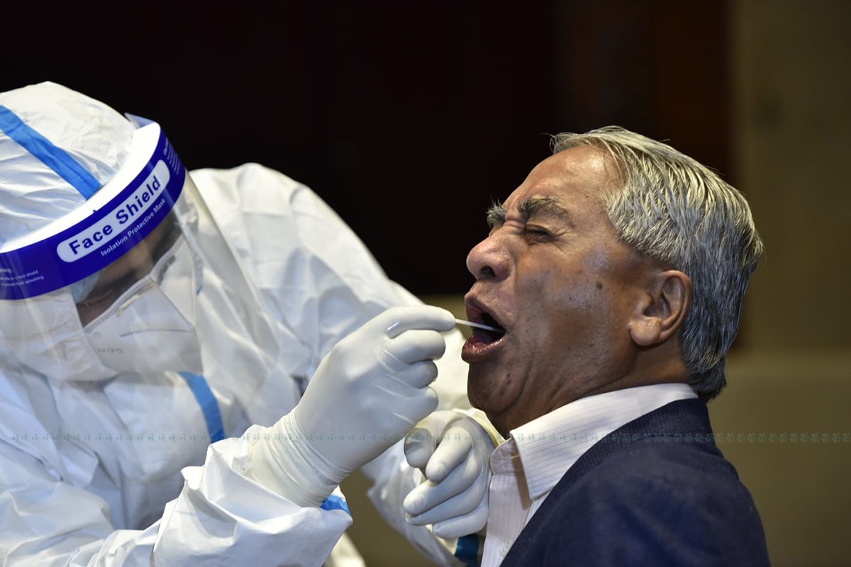 NC President Sher Bahadur Deuba getting throat swab extracted on Thursday.
