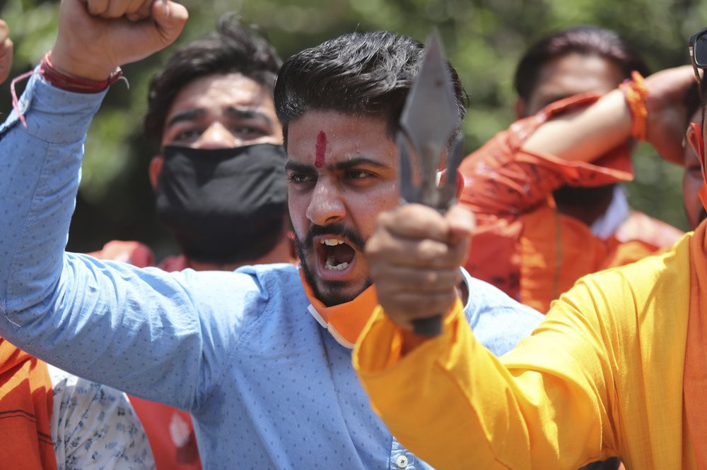 Activists of Rashtriya Bajrang Dal shout slogans during a protest against the Chinese government in Jammu, India, Wednesday, June 17, 2020.