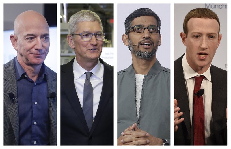 This combination of 2019-2020 photos shows Amazon CEO Jeff Bezos, Apple CEO Tim Cook, Google CEO Sundar Pichai and Facebook CEO Mark Zuckerberg.