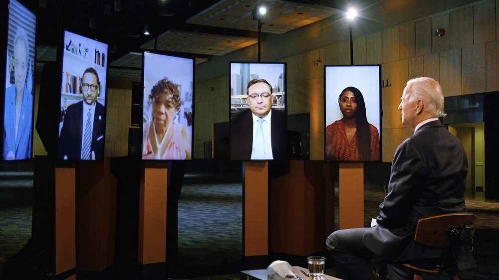 In this image from video, Democratic presidential candidate former Vice President Joe Biden leads a conversation on racial justice during the first night of the Democratic National Convention