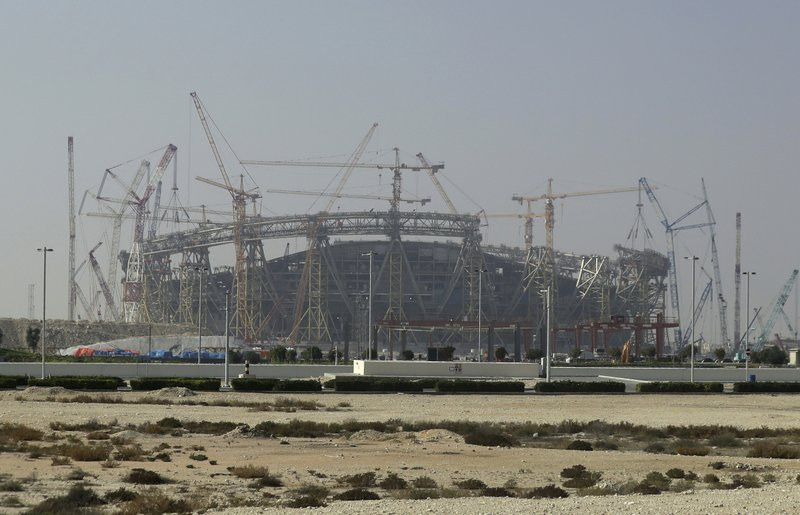 In this Dec. 20, 2019 file photo, construction is underway at the Lusail Stadium, one of the 2022 World Cup stadiums, in Lusail, Qatar.