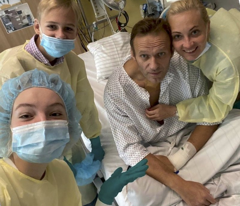 This handout photo published by Russian opposition leader Alexei Navalny on his instagram account, shows himself, centre, and his wife Yulia, right, daughter Daria, and son Zakhar, top left, 