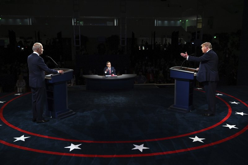 us President Donald Trump and Democratic presidential candidate former Vice President Joe Biden participate in the first presidential debate Tuesday, Sept. 29, 2020, at Case Western Universit