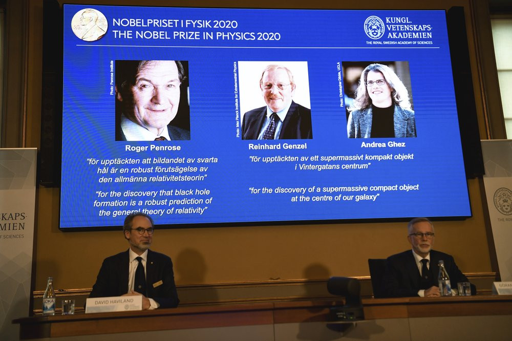 David Haviland, member of the Nobel Committee for Physics, left, and Goran K. Hansson, Secretary General of the Academy of Sciences, announce the winners of the 2020 Nobel Prize in Physics.