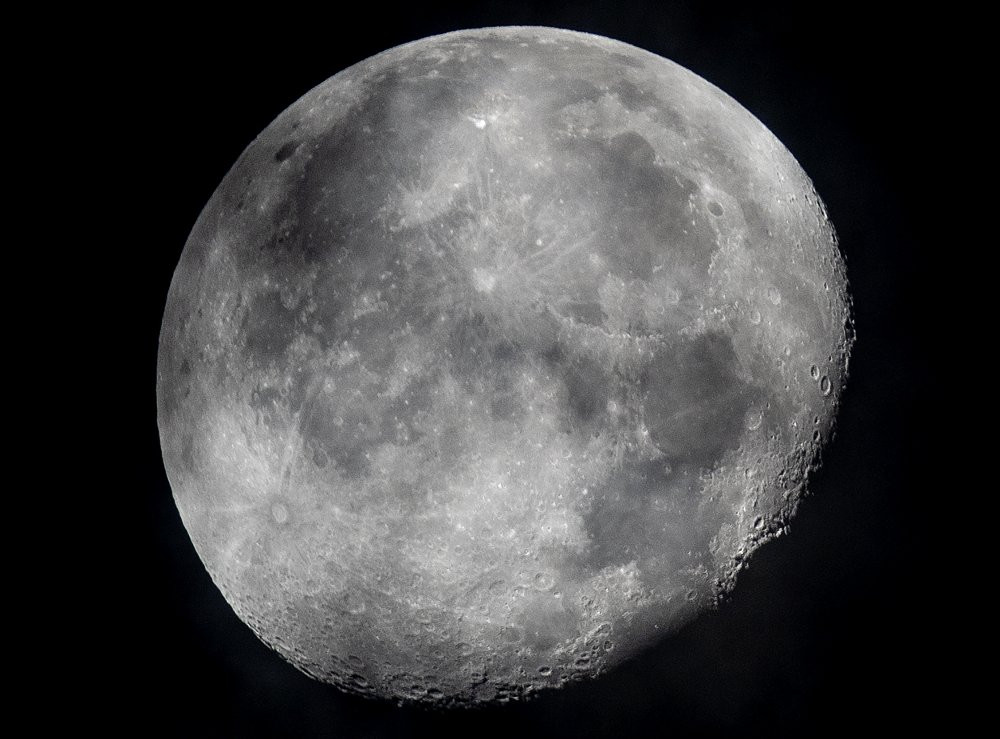 In this early Monday, Oct. 5, 2020, file photo, a waning moon is seen at the sky over Frankfurt, Germany.