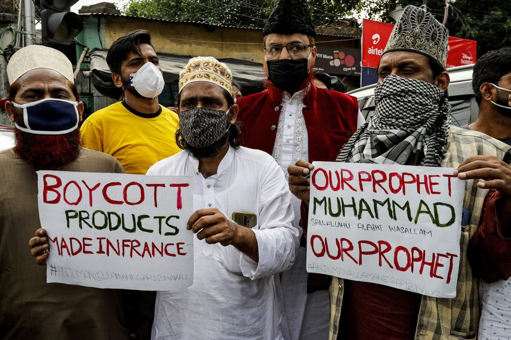 Muslim activists from various organizations participate in a protest against France, near the French Consulate, in Kolkata, India, Saturday, Oct. 31, 2020.