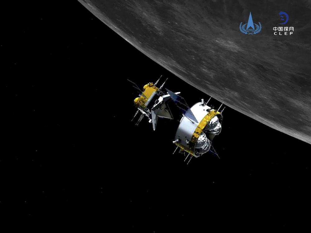 This graphic simulation image provided by China National Space Administration shows the orbiter and returner combination of China's Chang'e-5 probe after its separation from the ascender, at 