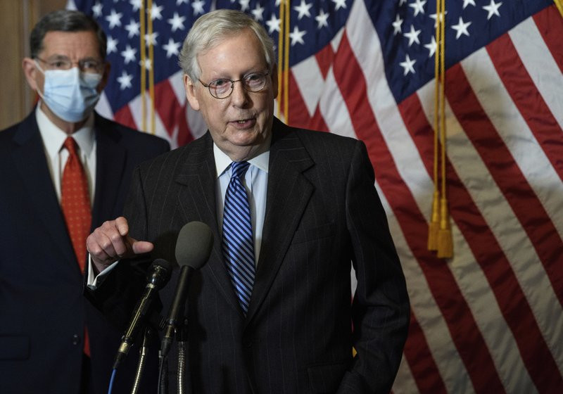 In this Tuesday, Dec. 15, 2020, file photo, Senate Majority Leader Mitch McConnell, of Kentucky, speaks during a news conference with other Senate Republicans on Capitol Hill in Washington, w