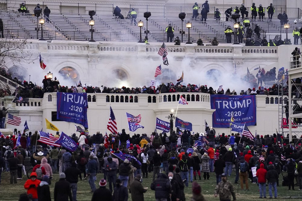 In this Wednesday, Jan. 6, 2021, file photo, violent protesters, loyal to President Donald Trump, storm the Capitol, in Washington.