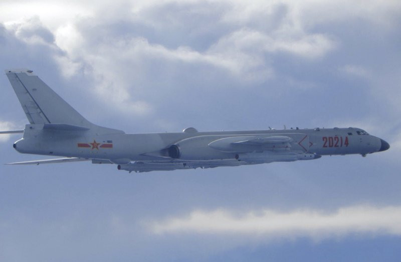In this photo released by the Taiwan Ministry of National Defense, a Chinese People's Liberation Army H-6 bomber is seen flying near the Taiwan air defense identification zone, ADIZ, near Tai