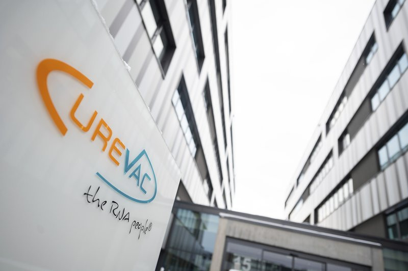 The logo of the biotech company Curevac with the slogan "the RNA people" is displayed at the company headquarters in Tuebingen, Germany, Thursday, Jan. 7, 2021.