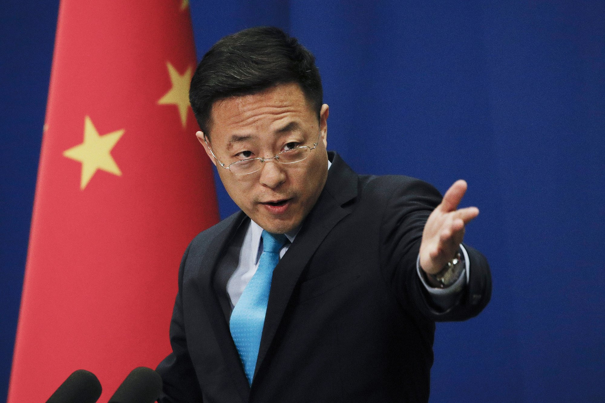 In this Monday, Feb. 24, 2020 file photo, Chinese Foreign Ministry spokesman Zhao Lijian speaks during a daily briefing at the Ministry of Foreign Affairs office in Beijing.