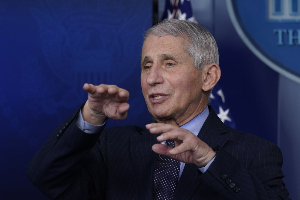 In this Jan. 21, 2021 file photo, Dr. Anthony Fauci, director of the National Institute of Allergy and Infectious Diseases, speaks with reporters at the White House, in Washington.