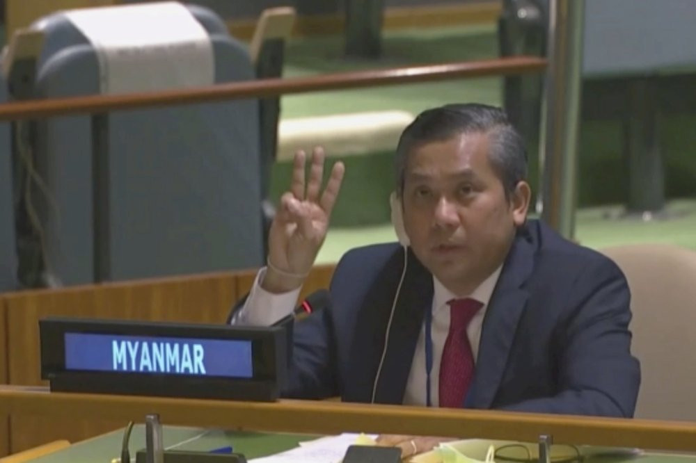 Myanmar Ambassador to the United Nations Kyaw Moe Tun flashes the three-fingered salute, a gesture of defiance done by anti-coup protesters in Myanmar, at the end of his speech before the U.N