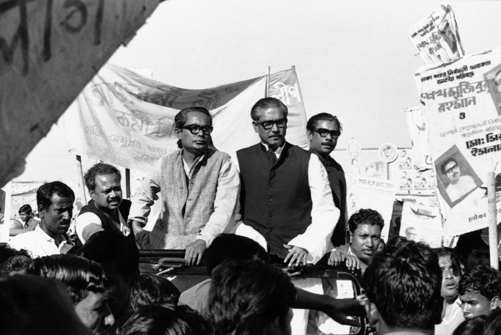 In this Dec. 7, 1970, file photo, Sheikh Mujibur Rahman, center on Rostrum, leader of East Pakistan's powerful Awami League, addresses an election rally in Dacca, East Pakistan.