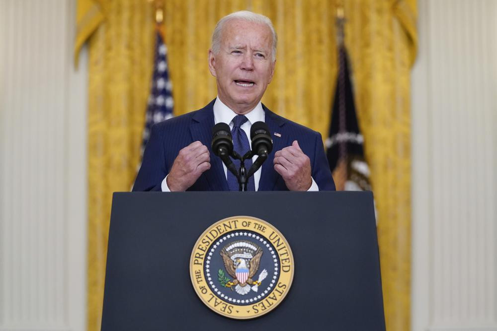 US President Joe Biden speaks about the bombings at the Kabul airport that killed at least 12 U.S. service members, from the East Room of the White House, Thursday, Aug. 26, 2021, in Washingt