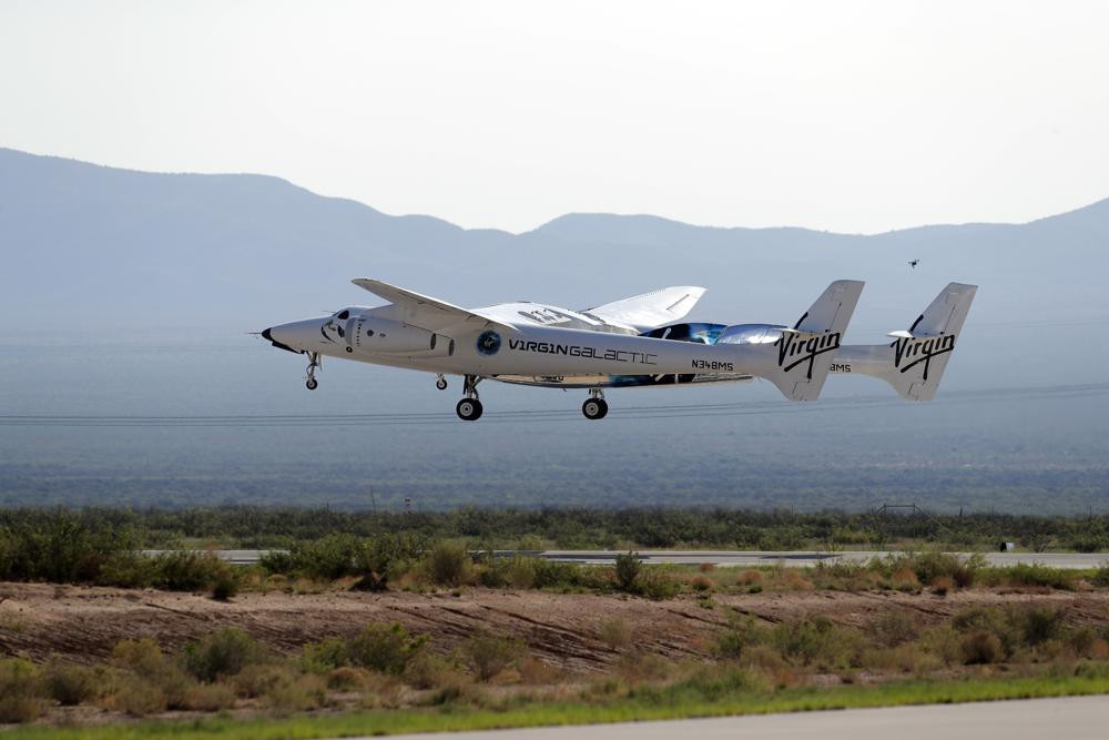 In this Sunday, July 11, 2021 file photo, the craft carrying Virgin Galactic founder Richard Branson and other crew members takes off from Spaceport America near Truth or Consequences, New Me