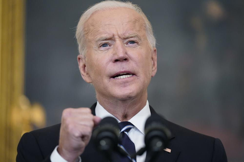 US President Joe Biden speaks in the State Dining Room at the White House, Thursday, Sept. 9, 2021, in Washington.