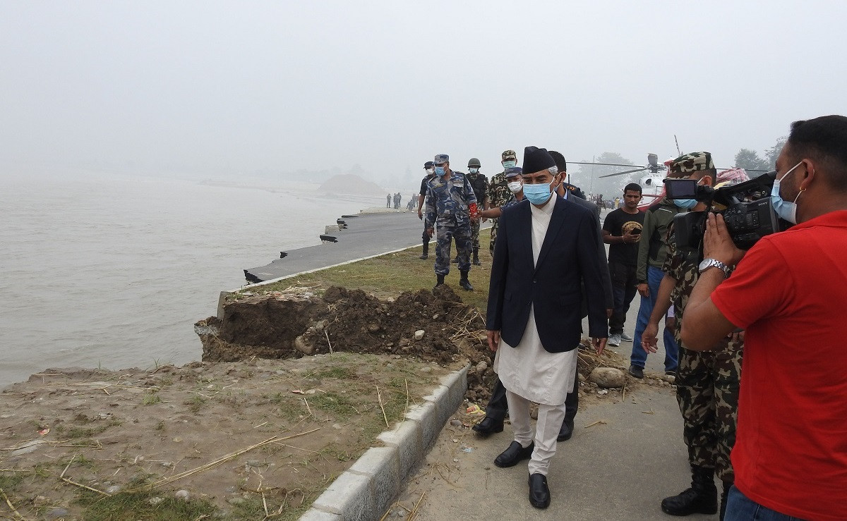 File Photo of Deuba inspecting flood-hit areas in Far West