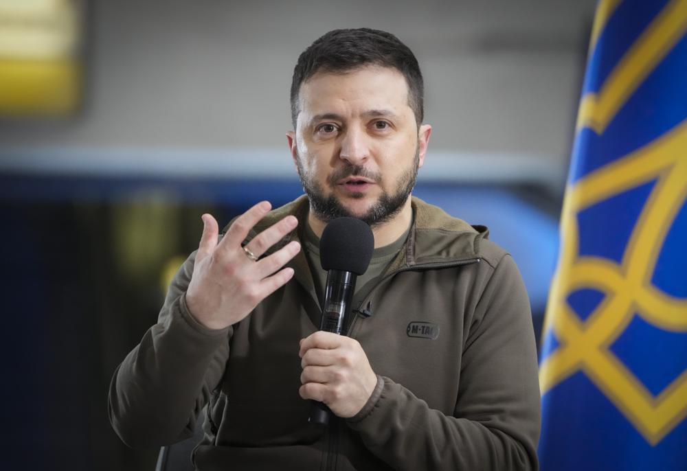 Ukrainian President Volodymyr Zelenskyy answers media questions during a press conference in a city subway under a central square in Kyiv, Ukraine, Saturday, April 23, 2022.