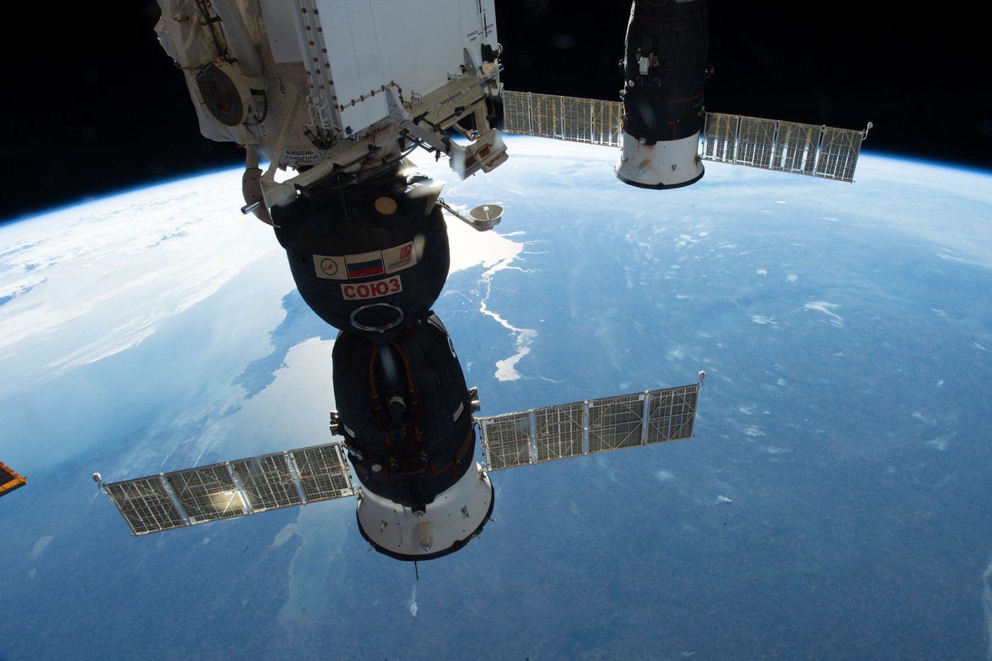 Spacecrafts docked to the International Space Station nearly 257 miles above Ukraine. (NASA Johnson, Flikr).