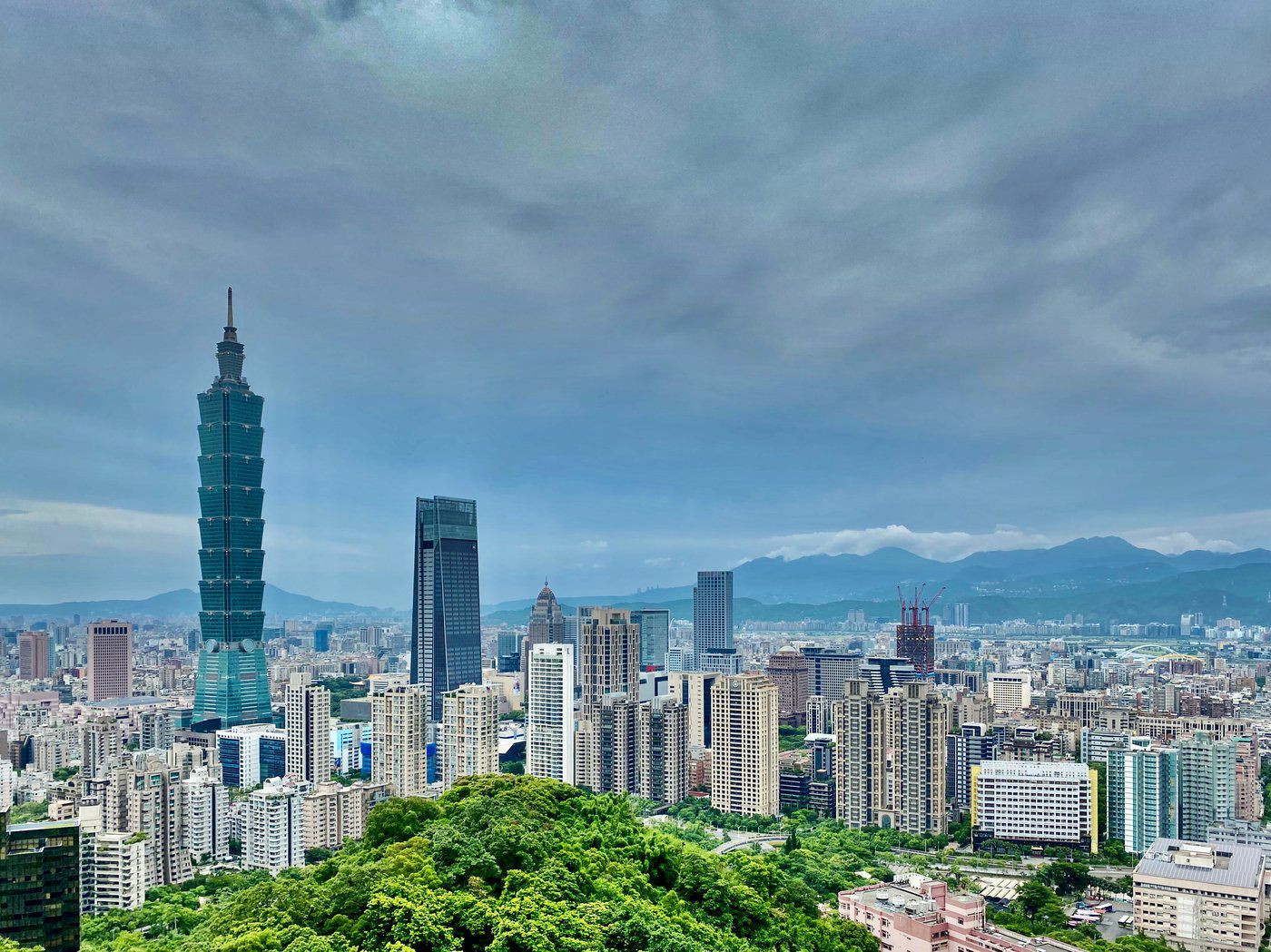 In Taipei, buildings block cooling breezes from flowing between mountain and sea.