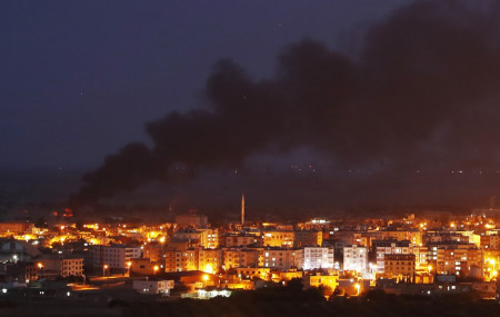 Syrian forces enter key border town blocking Turkish plans