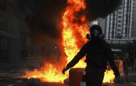 Hong Kong descends into chaos as protesters defy ban
