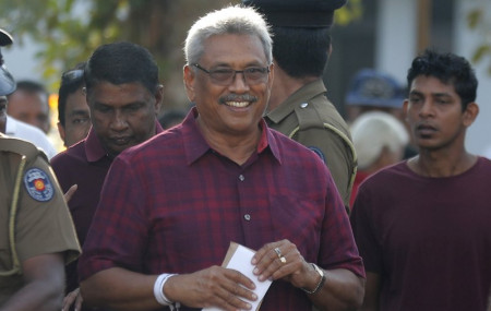 Former Lankan defense chief and Mahinda Rajapaksa's younger brother wins presidential vote