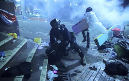 Hong Kong police storm university held by protesters