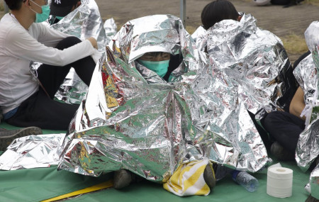 100 anti-government protesters holed up at Hong Kong university surrounded by police