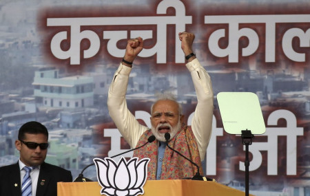 Modi defends new law as protests go on