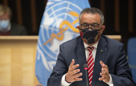 In this photo released by WHO on Monday, Oct. 5, 2020, WHO Director-General, Dr Tedros Adhanom Ghebreyesus, wearing a mask to protect against coronavirus, gestures during a special session on