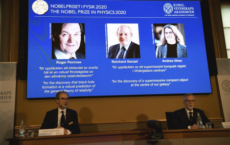 David Haviland, member of the Nobel Committee for Physics, left, and Goran K. Hansson, Secretary General of the Academy of Sciences, announce the winners of the 2020 Nobel Prize in Physics.